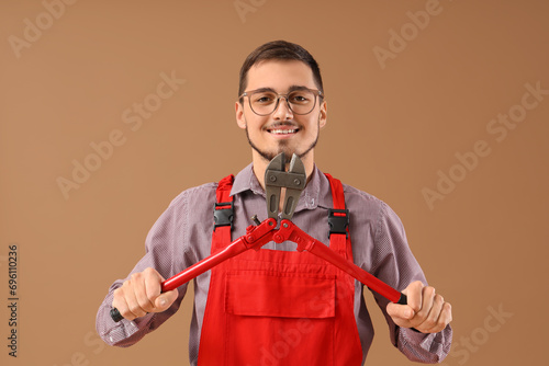 Young male worker in eyegla...