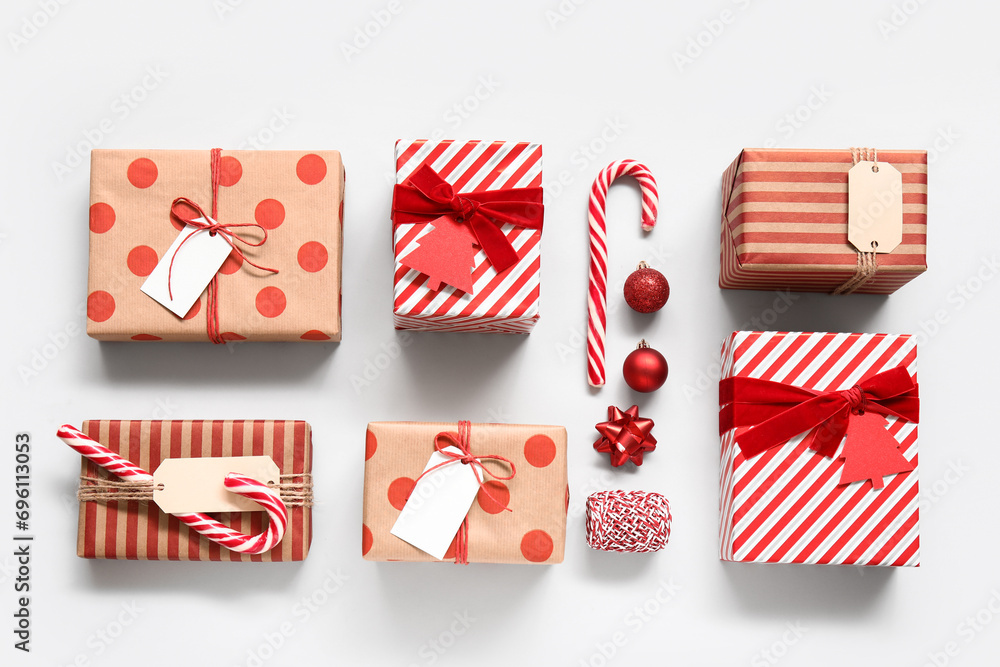 Obraz premium Composition with gift boxes and Christmas decorations on white background