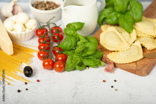 set of Italian products. Mozzarella cheese, cherry tomatoes, parmesan