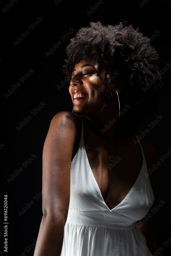 Half-closed portrait of a beautiful woman, with black hair, wearing white clothes. Half-closed portrait of a beautiful woman, with black hair, wearing white clothes.