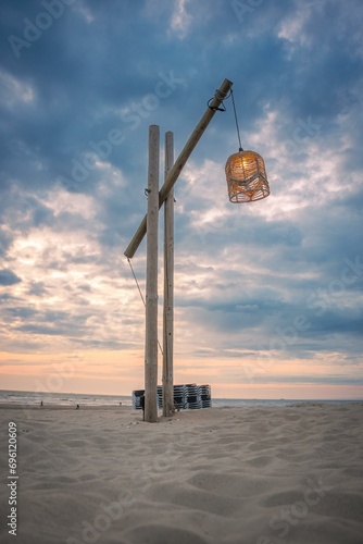 Wooden lantern on the beach at sunset, Zandvoort, Netherlands