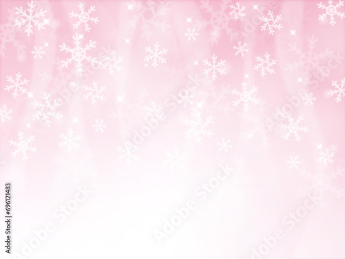 雪の結晶とピンクのキラキラした輝く背景
