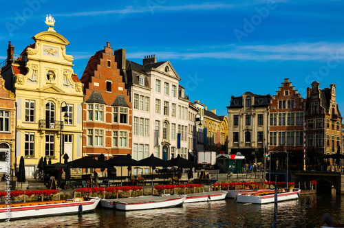 View of Graslei quay and Leie river in historic city center in Ghent, Belgium photo