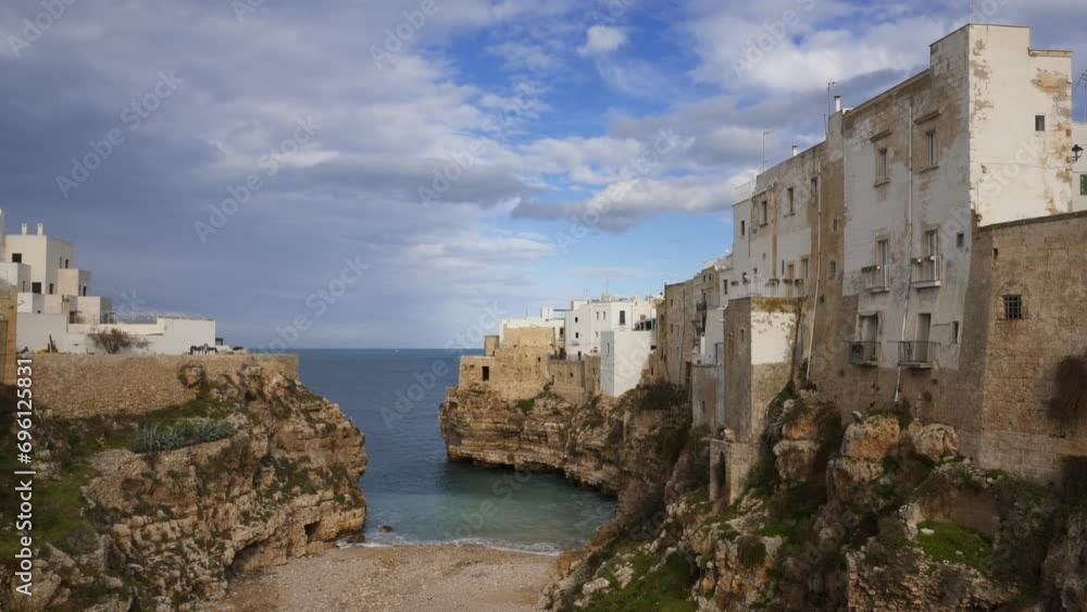 Polignano a Mare iconic touristic city and beach on the sea cliffs in the south of Italy in Puglia, Italy Polignano a Mare iconic touristic city and beach on the sea cliffs in the south of Italy in Puglia, Italy