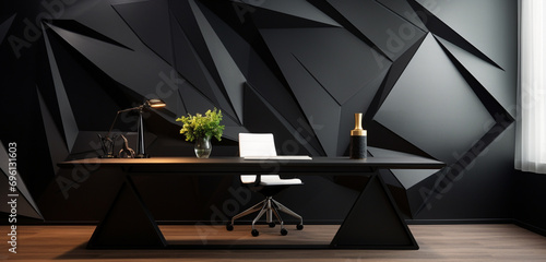 A home office with a striking 3D geometric wall pattern in monochrome and a minimalist metal desk