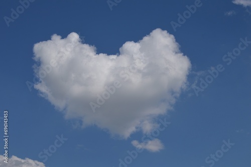 heart shaped clouds and blue sky