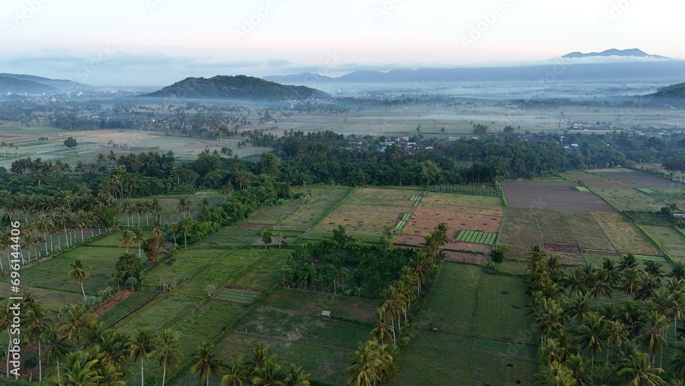 Morning atmosphere in Tempos hamlet, Gerung, West Lombok. a cold, wet mist blanketed the countryside