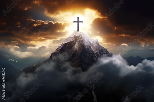 Cross of Jesus Christ on the top of the mountain in the clouds, Religion concept.  © Nongkran