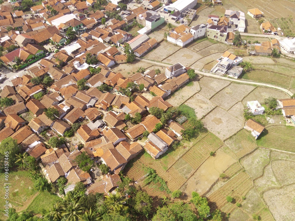 Drone Photography. Aerial Landscapes. Patchwork Landscape and Village in the Morning, Located in Rancaekek, Bandung - Indonesia. Aerial Shot from a flying drone.