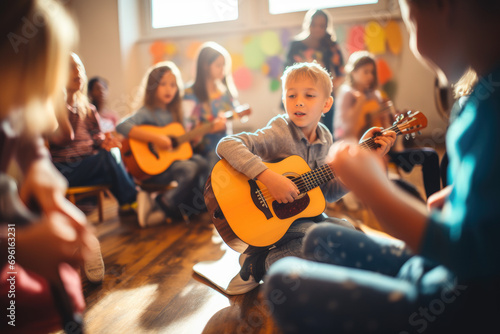 Foto young children playing guitar in classroom