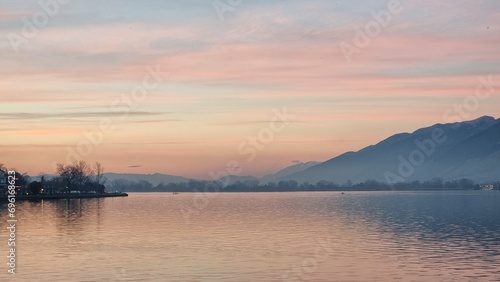 ioannina by the lake pamvotis in winter season sunset in greece