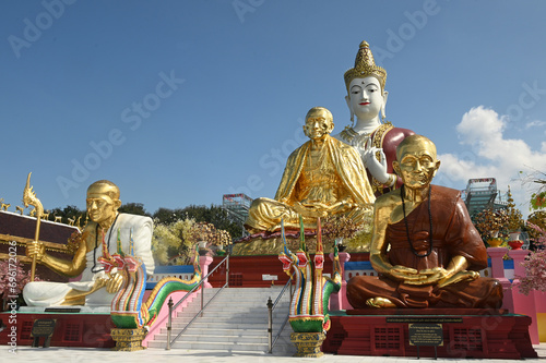 Phra Sri Ariyamettriya Borom Bodhiyan It is a large outdoor sitting Buddha image, about 50 meters high, and a noble monk. Enshrined at Wat Saeng Kaew Phothiyan. Located at Chiang Rai in Thailand. photo