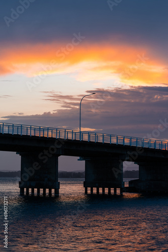 A light pole on the bridge at sunset time. © AlexandraDaryl