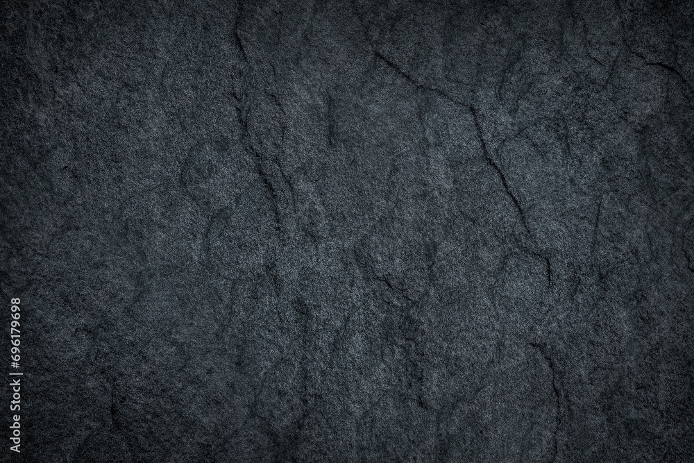 Dark grey black slate stone texture background Dark grey black slate stone texture background