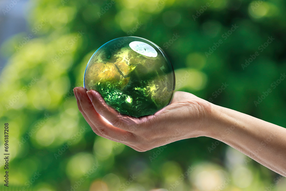 Energy saving concept Hand of human holding green world with environment icon, Save world, sustainable environment concept. Energy saving concept Hand of human holding green world with environment icon, Save world, sustainable environment concept.