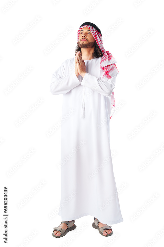 Full-length portrait of young middle-east man in thobe dress on white background Full-length portrait of young middle-east man in thobe dress on white background