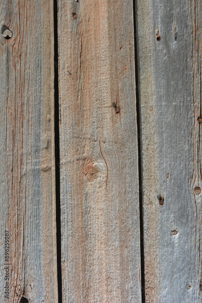 Unusual old wood, wooden boards with old peeling paint with an interesting textured structure with old rusty nails and crevices. Unusual old wood, wooden boards with old peeling paint with an interesting textured structure with old rusty nails and crevices.