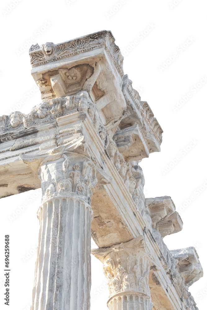 Close up fragment of the entablature of the ruined temple of Apollo in Side (Turkey) with a stone-cut relief on the frieze. Isolated, no background, vertical. History, art or architecture concept