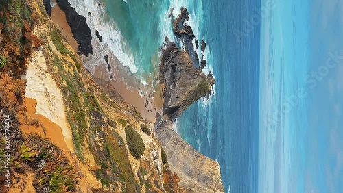 The Almograve Beach With Black Basalt Rocks in Alentejo Coast, Portugal. In the Footsteps of Rota Vicentina. Hiking Fisherman Trail.