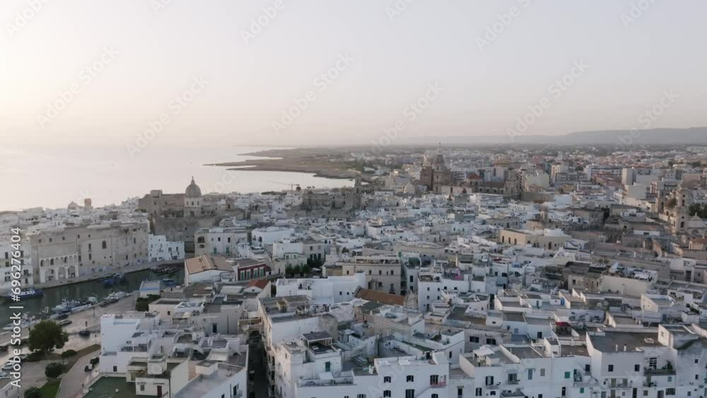 Aerial flyover in the morning of the small downtown of Monopoli, Italy. Aerial flyover in the morning of the small downtown of Monopoli, Italy.