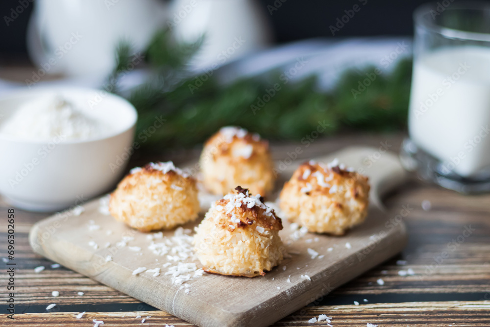 Coconut baking, sweet dessert. On a wooden background
Coconut baking, sweet dessert. On a wooden background