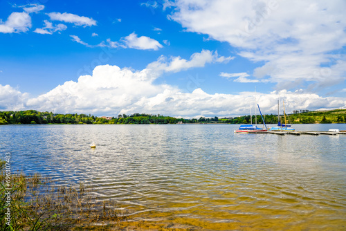 Nature at the Brucher Dam near Marienheide in North Rhine-Westphalia. View of the lake with the surrounding landscape. 