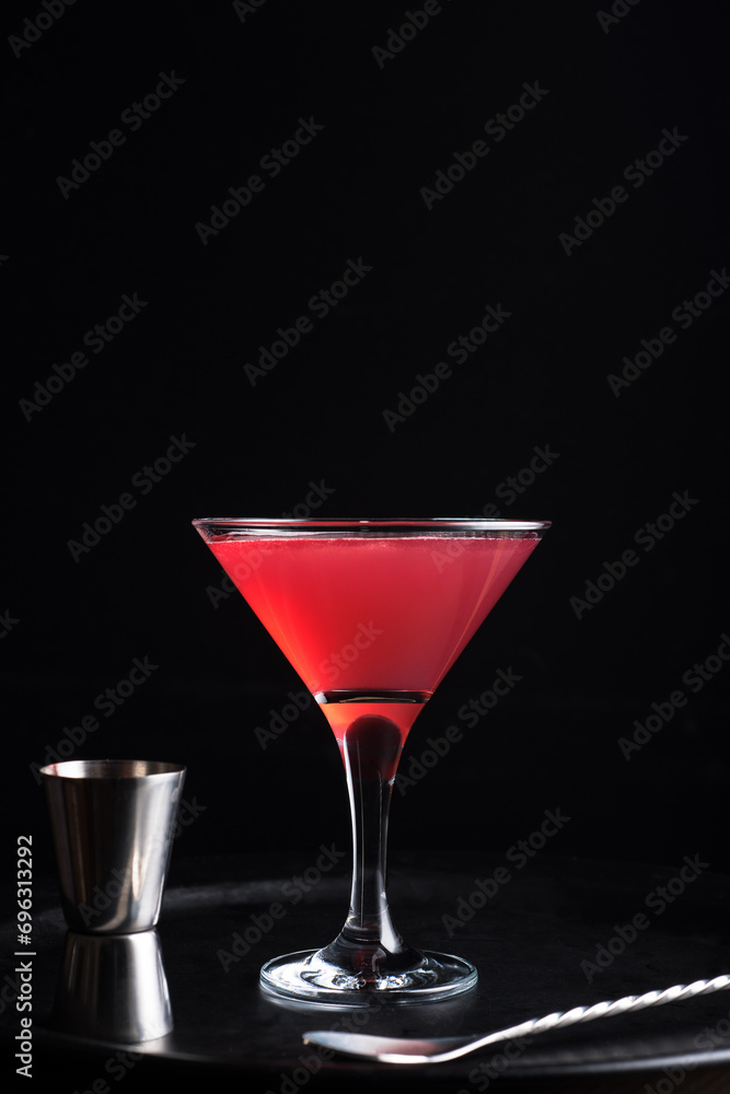 Cosmopolitan cocktail on a dark background. Cosmopolitan cocktail on a dark background.