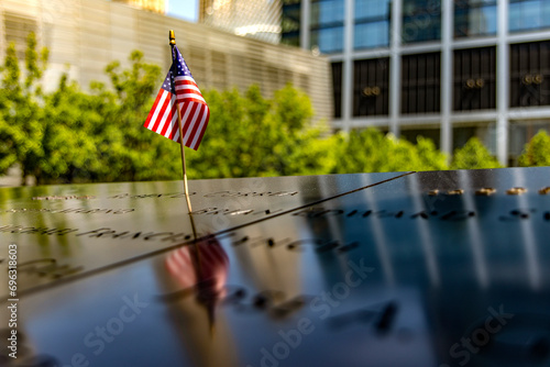 American flag at the World Trade Center memorial, tribute to the victims of the terrorist attack of 11 s in New York (USA).