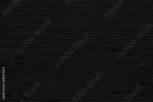 Black brick wall texture background. wallpaper for interior and exterior and backdrop design.