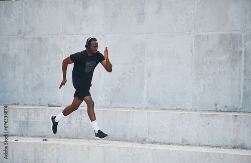 Active lifestyle. Sportive black man is running, morning routine