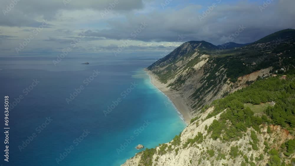 Drone aerial view of amazing Egremni beach wild coast and sea cliffs with turquoise water in Lefkada island, in Greece Drone aerial view of amazing Egremni beach wild coast and sea cliffs with turquoise water in Lefkada island, in Greece