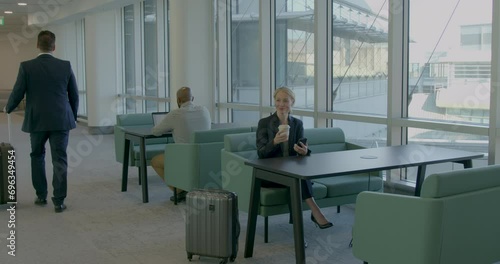 Business PeopleWorking in Airport Departure Lounge photo