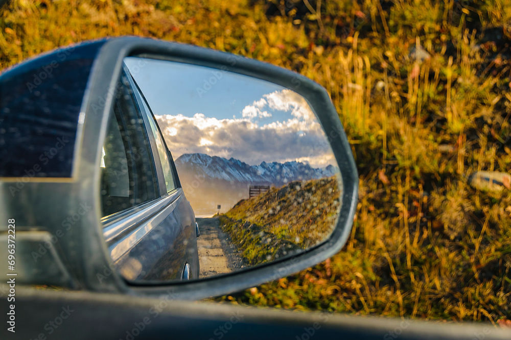 Andes mountain view through rearview car