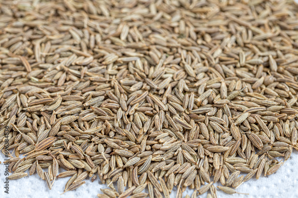 Cumin Jeera spice background. close-up view of zira. Cumin seeds from above. High angle photo of zira jeera cumin spices