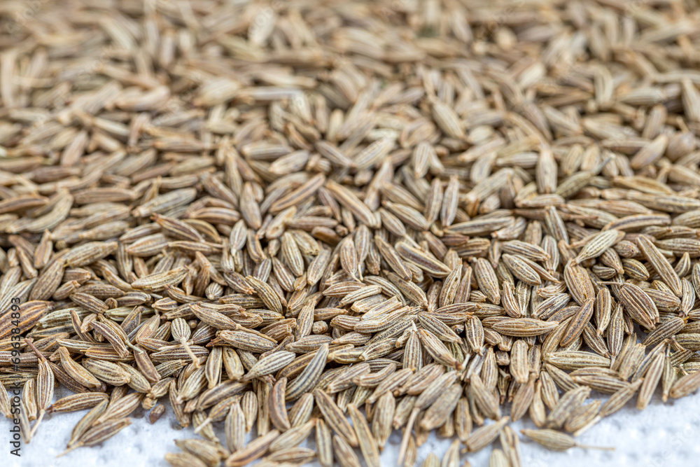 Cumin Jeera spice background. close-up view of zira. Cumin seeds from above. High angle photo of zira jeera cumin spices Cumin Jeera spice background. close-up view of zira. Cumin seeds from above. High angle photo of zira jeera cumin spices