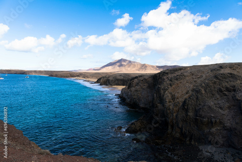 Panoramic view of the rocky coastline of Papagago on Lanzarote in a volcanic landscape in Los Ajaches National Park. Playa Blanca, Lanzarote, Spain photo