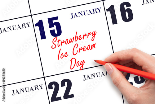 January 15. Hand writing text Strawberry Ice Cream Day on calendar date. Save the date.