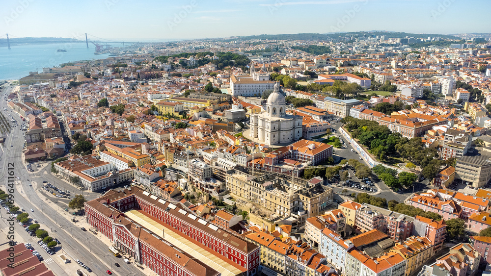 Cinematic aerial perspective of beautiful Lisbon capital city of Portugal. View of National Pantheon. Famous European travel destination. Rooftops of Lisbon. Panoramic view of all city center