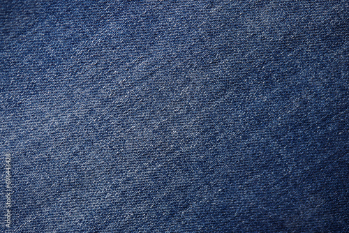 Fabric texture. Blue jeans background and texture. Close up of blue jeans background. Denim texture in high-resolution © EvgeniyQW
