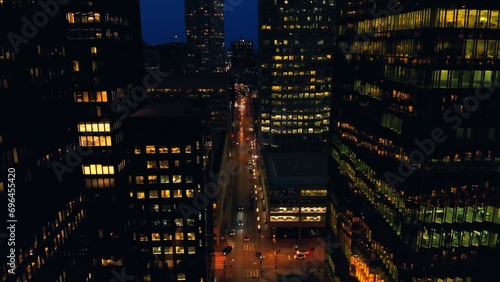 Canada's largest city Toronto in night lights. View of crowded city with skyscrapers metropolis never sleeps Financial business downtown night skyscrapers concept filmed in air with drone