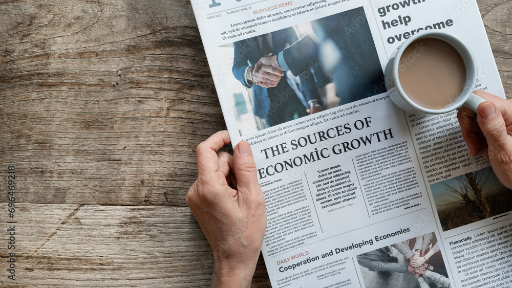 Naklejka premium Newspaper on the wooden desk