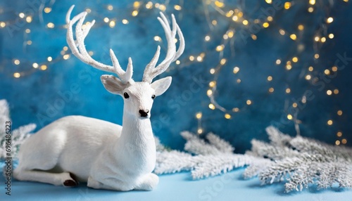 White deer on a blue background. New year concept