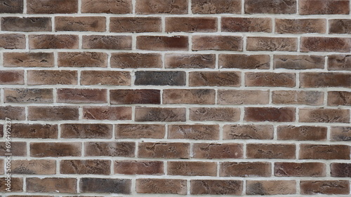 graphic resource of a brown brick wall with white seams as an empty copy space texture, textured background of dark brickwork with light block border lines, fragment of a wall or fence