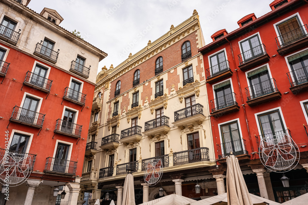 Picturesque buildings with colorful facades in the main square of Valladolid, Spain.