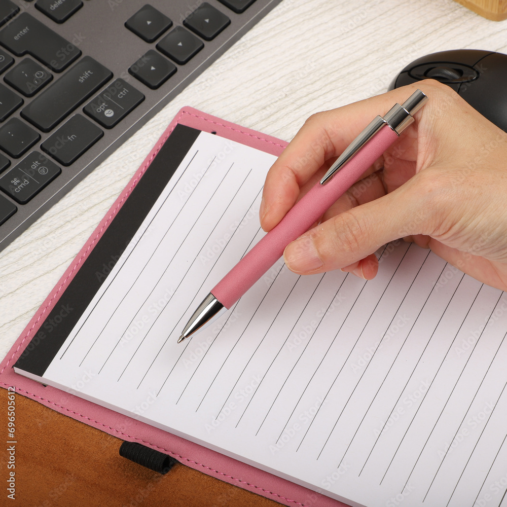 Colorful leather pen. Concept shot, top view, different colors pens. Blank space for text. Hold pen woman hand. Special background pen view