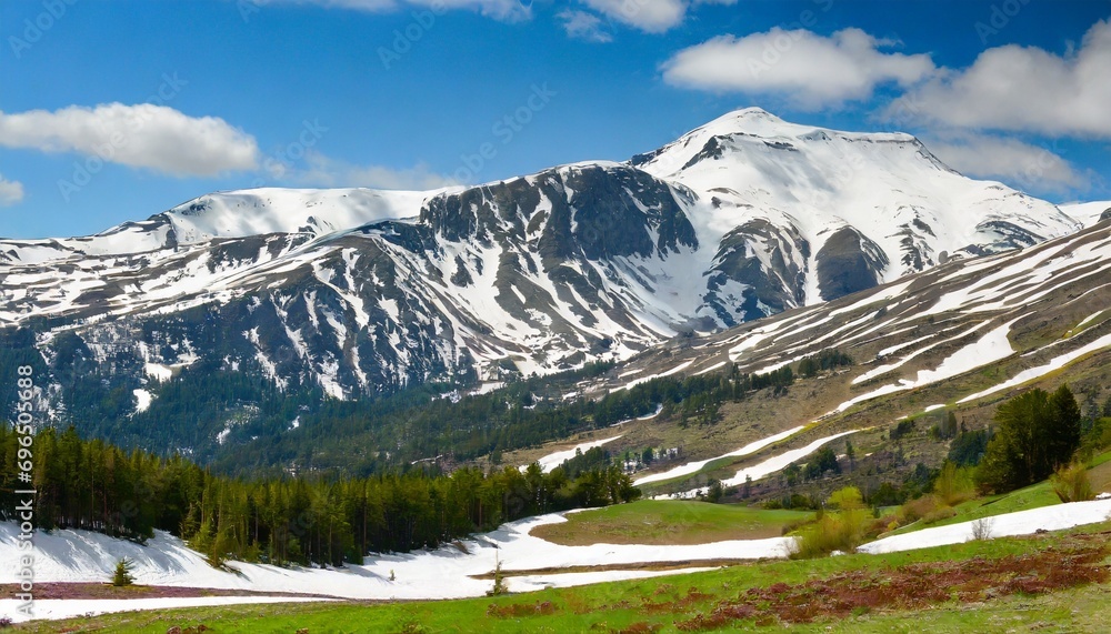 snow covered mountain in spring