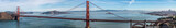 panoramic aerial landscape view of San Francisco Bay Area with Golden Gate Bridge in front and San Francisco downtown in right upper corner. 