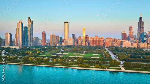 Skyline view of Chicago coastline with Lake Michigan aerial and skyscrapers at sunrise