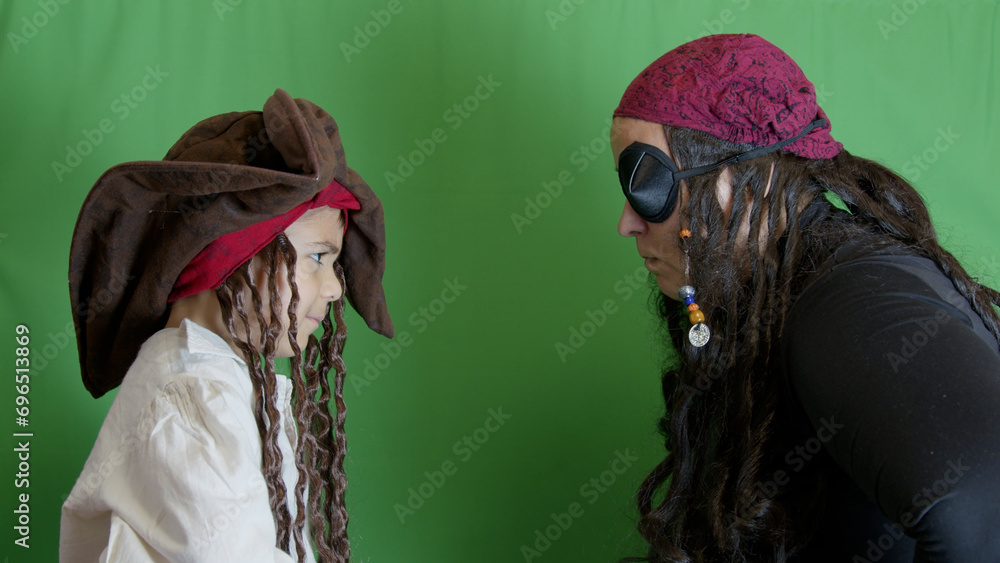 Obraz premium Pirates getting angry and fighting with cutlasses. Isolated on green background,. High quality photo