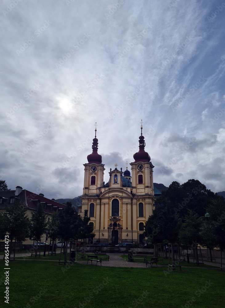 View from the park to the baroque church with a nice sky